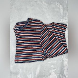 women’s multi colored, cropped long sleeve dickies shirt.